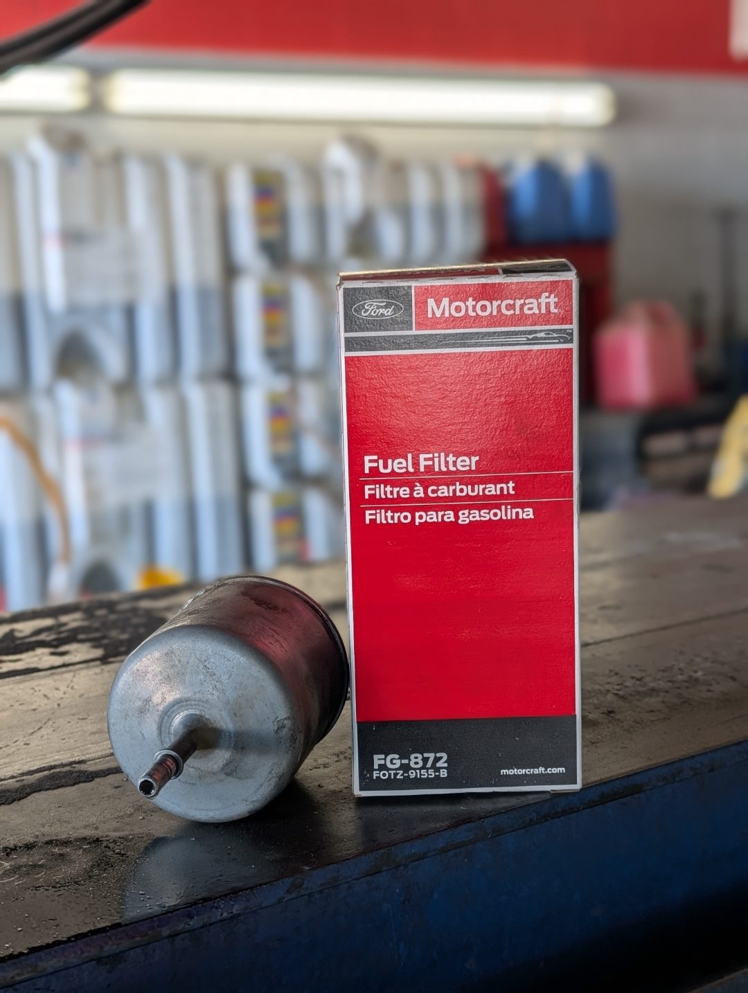 New Ford Motorcraft fuel filter on the shop counter before installation